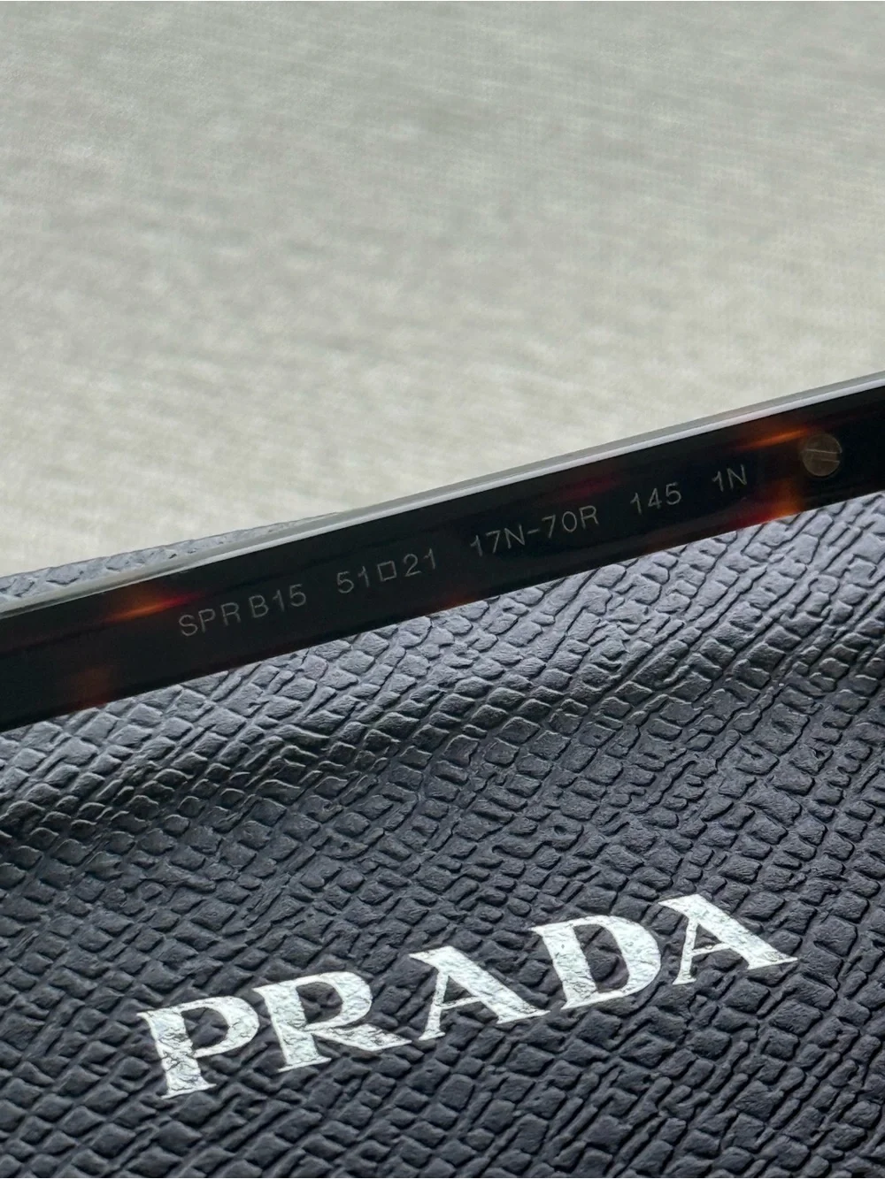 Prada Black Textured Leather Wallet with Silver Logo
